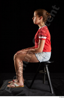  Ruby  1 dressed flip flop jeans shorts red t shirt sitting whole body 0001.jpg